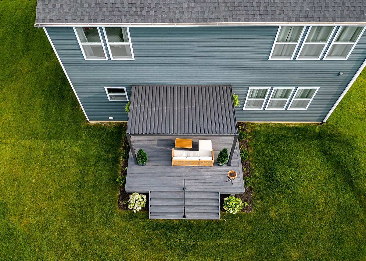 Drone shot of a Gray Green Shield deck built by Green Shield Deck Builders featuring a Green Shield Pergola.